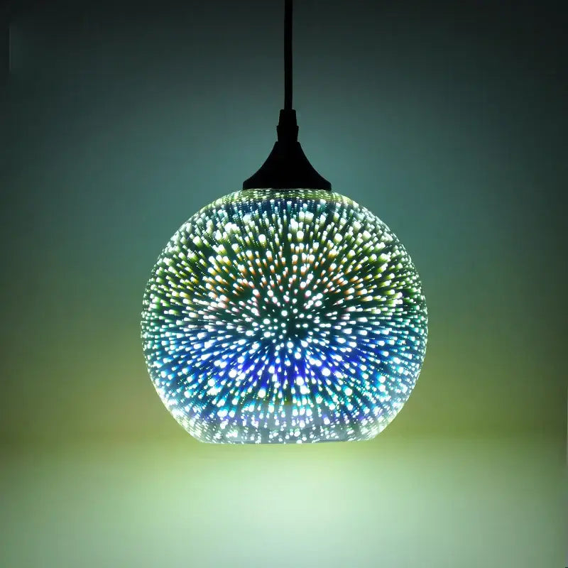 A spherical glass pendant light with blue and white led starburst pattern for living room decor