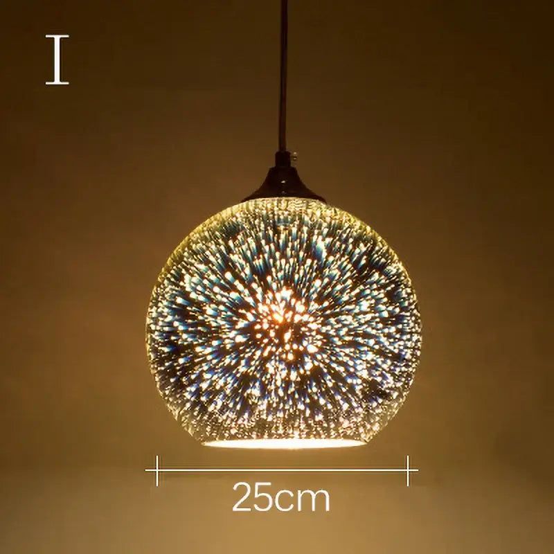 A spherical glass pendant light featuring a radiant blue and gold starburst pattern for living room decor