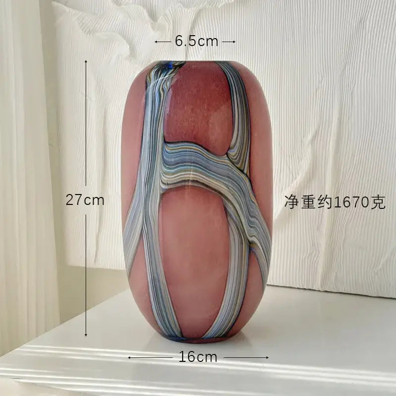 A sleek 27cm tall irregular geometric graffiti glass vase with soft pink base and flowing blue gray swirls for decorbites decor
