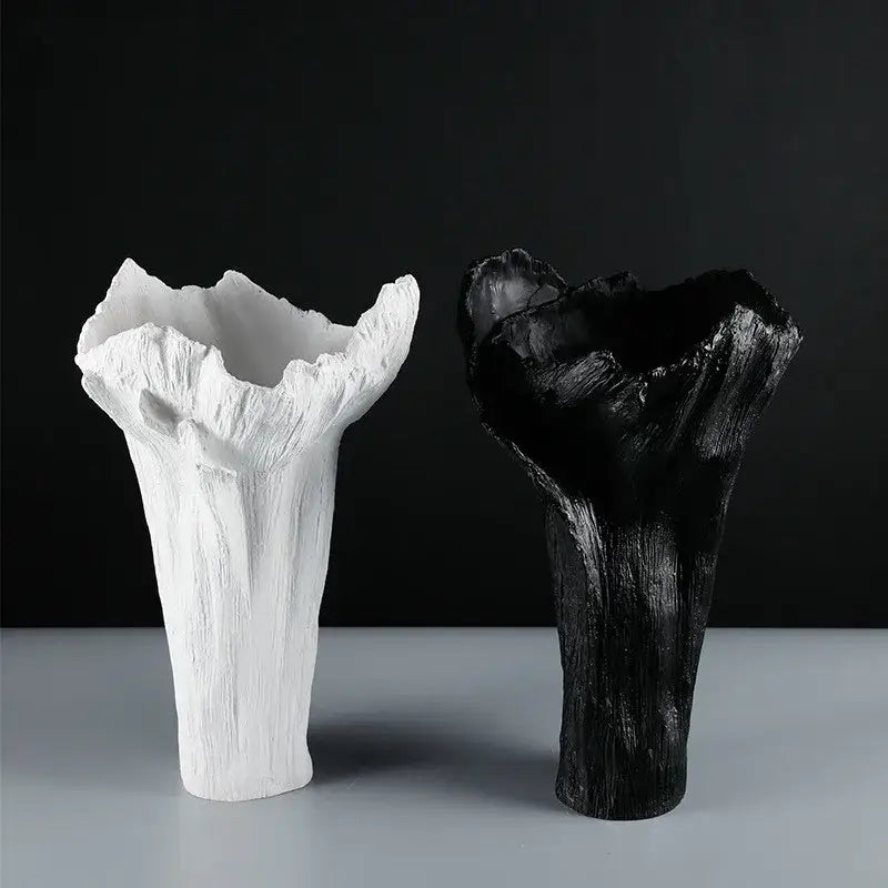 White and black irregular resin vase with textured tree trunk design for living room decor by decorbites irregular resin