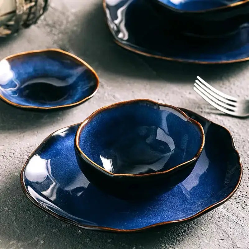 Deep cobalt blue ceramic bowl with irregular shape and rustic finish from decorbites irregular shape dinner set