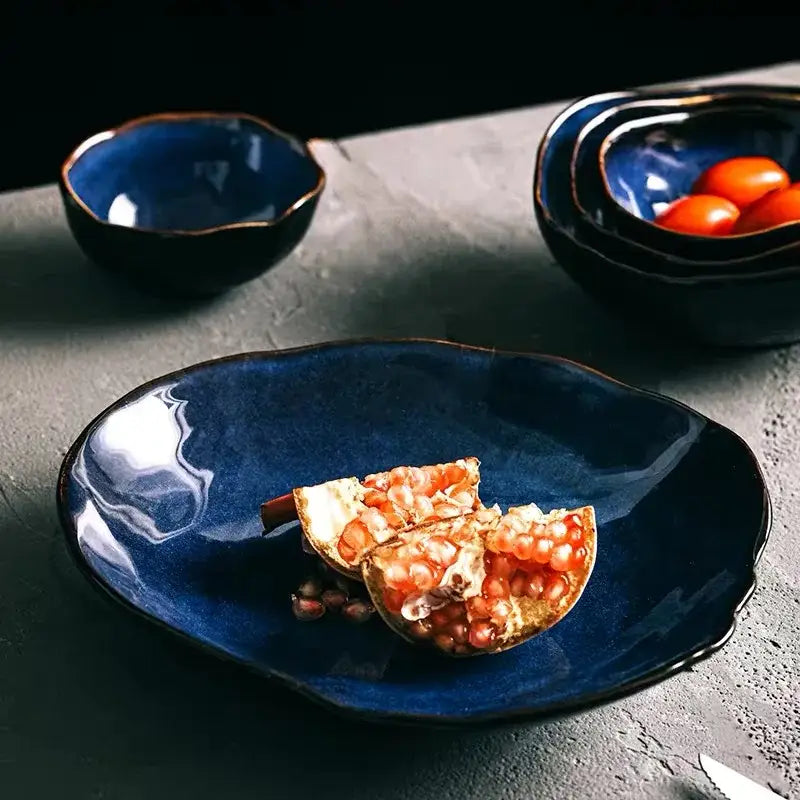 Deep blue ceramic dinner plate with glossy finish and irregular shape from decorbites irregular shape dinner set