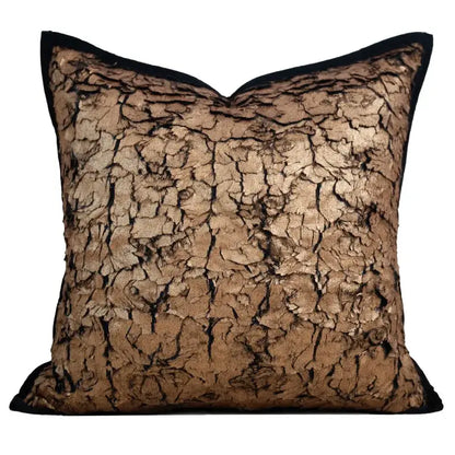 A square italian light luxury cushion cover in metallic bronze fabric with cracked texture and black piping decorbites italian light