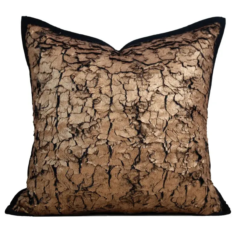 A square italian light luxury cushion cover in metallic bronze fabric with cracked texture and black piping decorbites italian light