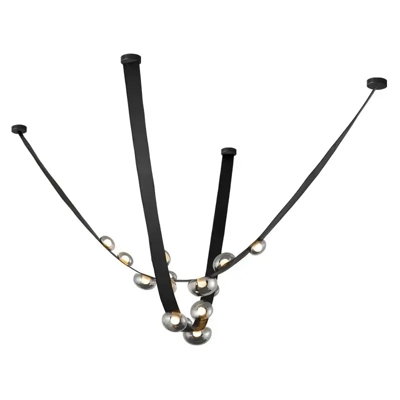 Black leather strap chandelier with spherical glass bulbs in italian light luxury decorbites dining room design