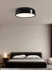 Black circular ceiling lamp with glossy finish and soft white illumination decorbites italian minimalist round design