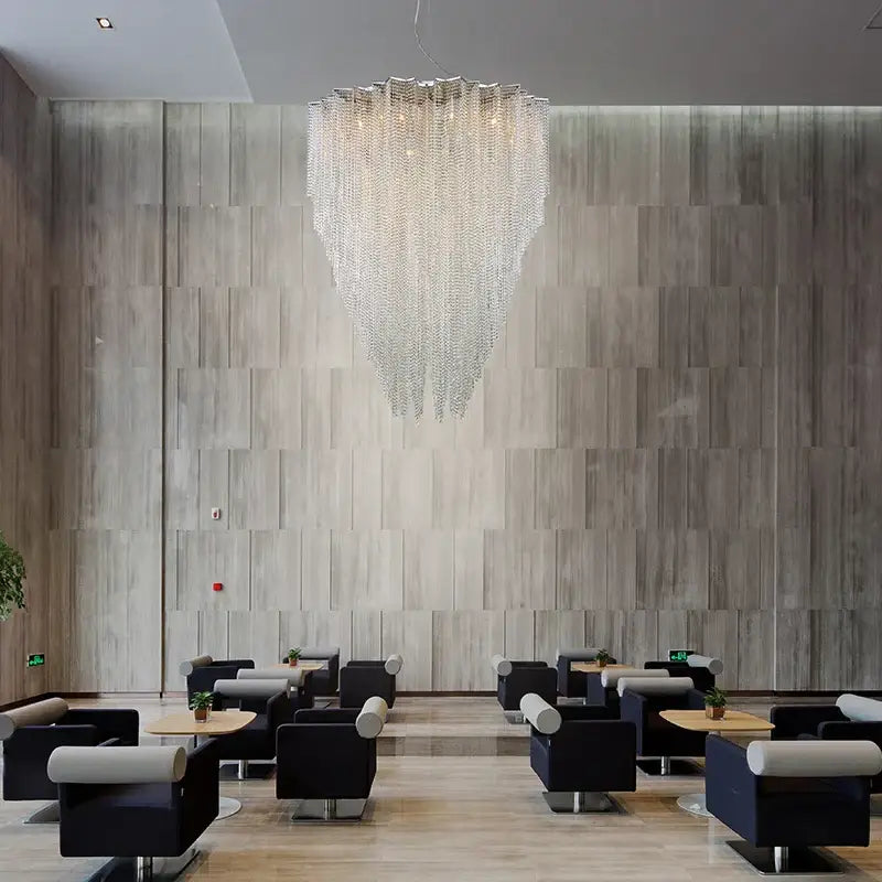 A cascading crystal tassel pendant light with a modern geometric design by decorbites for bedroom decor