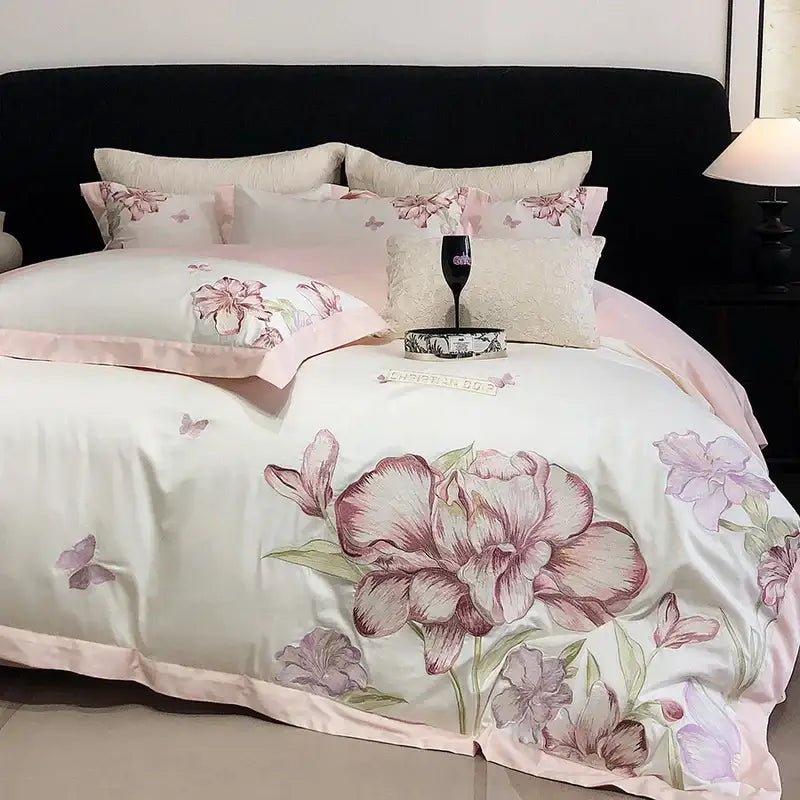 Elegant ivory satin duvet cover featuring blooming flowers embroidery with soft pink and mauve blossoms for bedding set decorbites