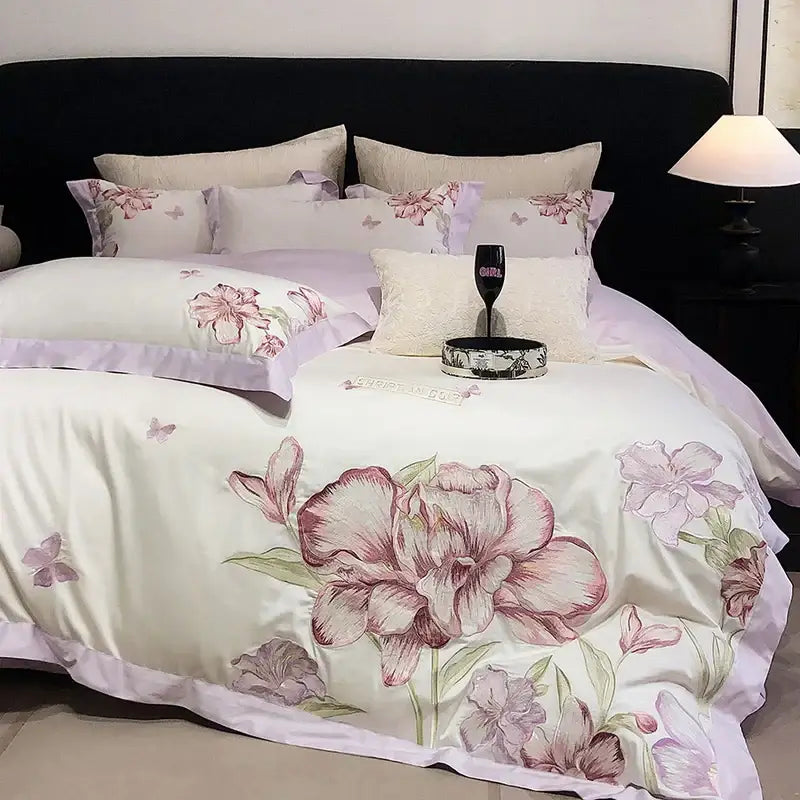 Ivory satin bedding set with decorbites blooming flowers embroidery featuring large pink peonies and mauve blossoms