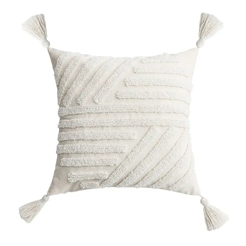 Cream-colored decorbites ivory tufted cushion cover with textured stripes and tassels for living room decor