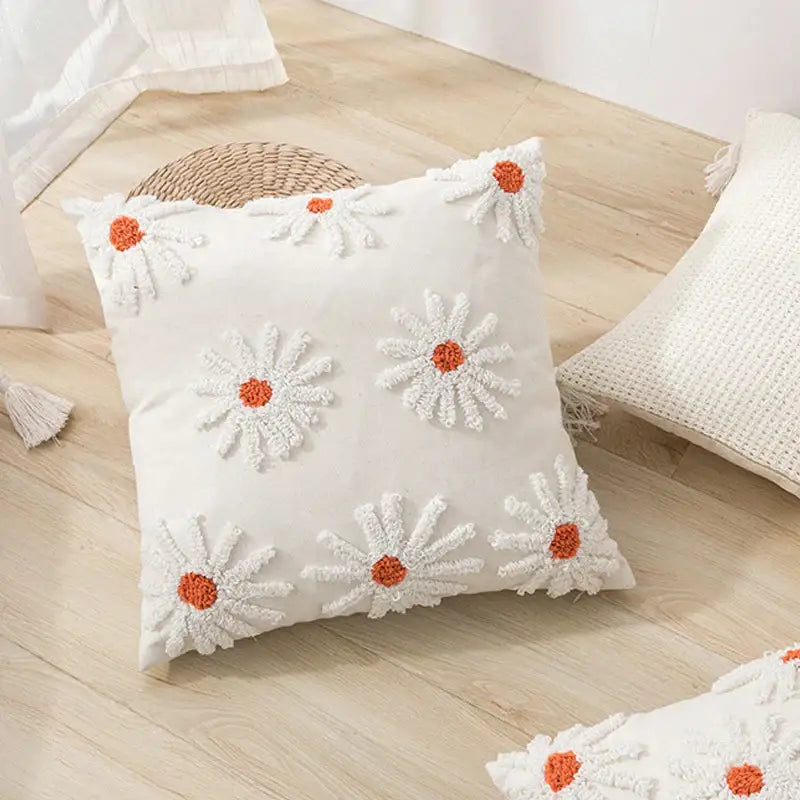 Ivory tufted cushion cover with white daisy embroidery featuring fluffy petals and vibrant centers for living room decorbites decor