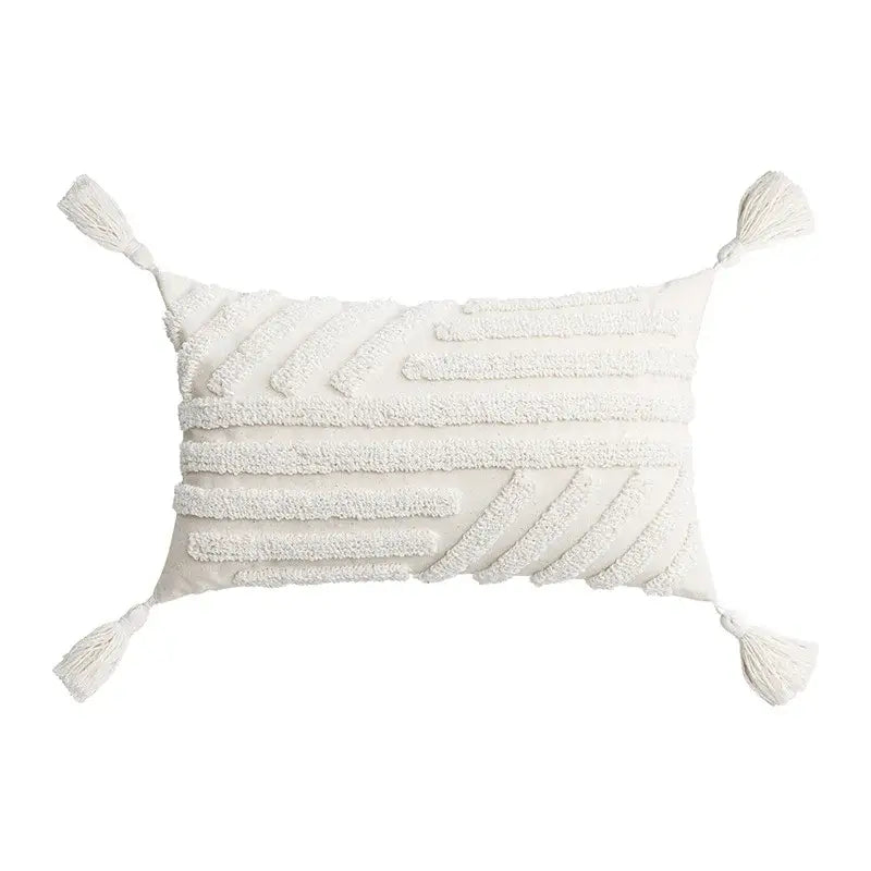 Cream-colored ivory tufted cushion cover with woven tassels and white daisy embroidery for living room decorbites decor