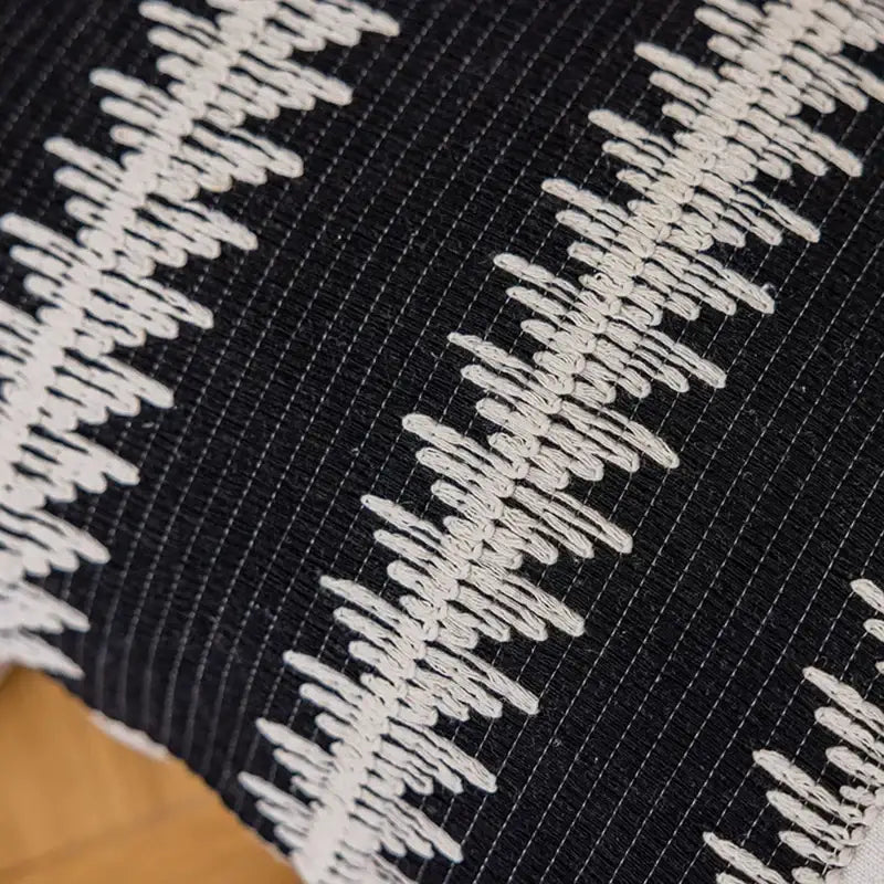 Black and white jacquard crochet pillow covers featuring textured embroidered zigzag pattern for living room decorbites decor