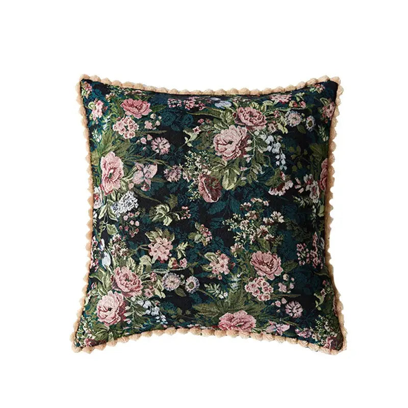 Dark green velvet pillow case with intricate pink and white floral embroidery and beige fringe for jacquard farmhouse decor