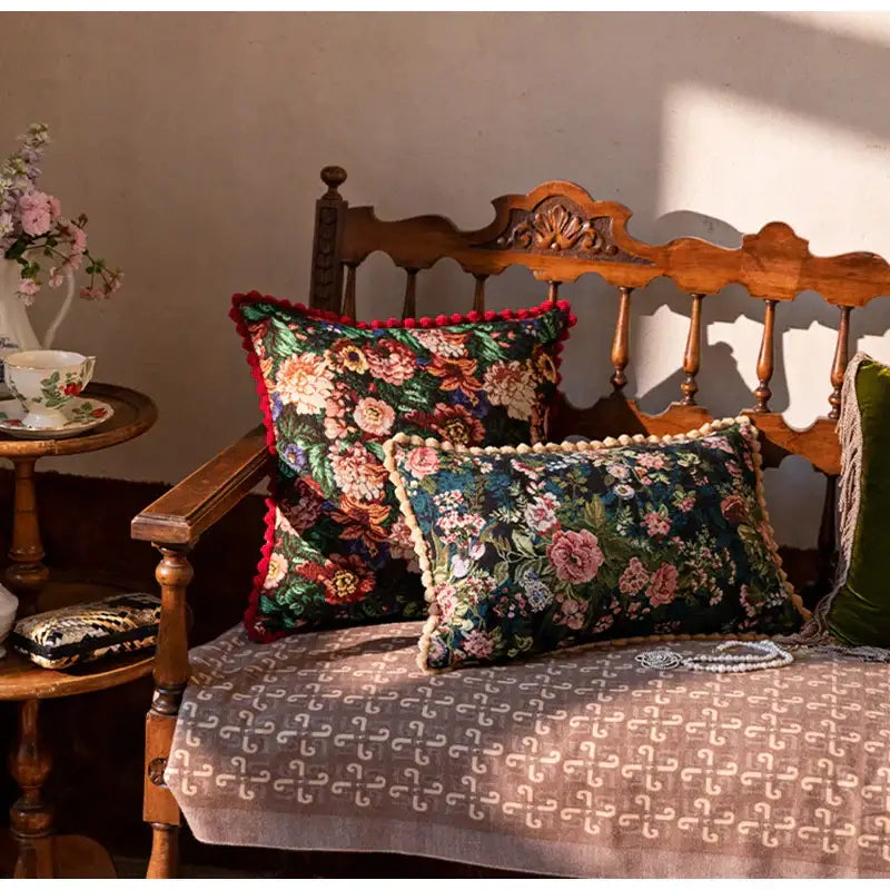 Two dark green velvet pillow cases with pink red gold floral embroidery and pom-pom trim decorbites jacquard farmhouse decor