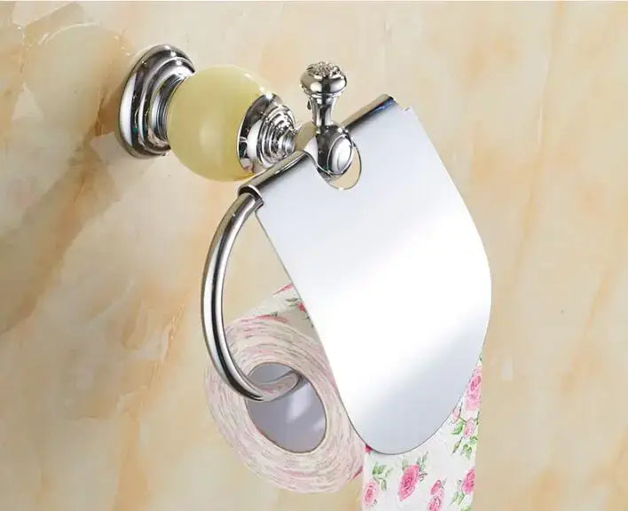 Chrome-finished toilet paper holder with pale yellow ceramic knob and floral tissue roll from jade bathroom set decorbites brass