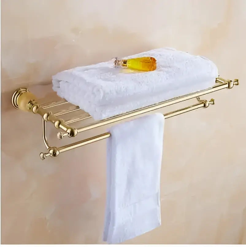 Gold-toned bathroom towel rack with polished finish and two bars from jade gold bathroom accessories set with amber marble