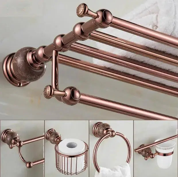 Rose gold multi-tiered towel rack with ornate spherical finials and brushed metal finish from jade rose gold bathroom set