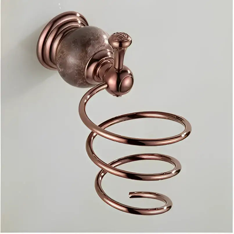 Antique copper-finished spiral towel rack with decorative knob and textured base from jade rose gold bathroom set