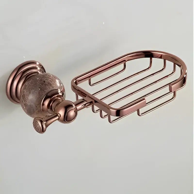 Rose gold-toned metal soap dish with decorative textured wall-mounted bracket from jade rose gold bathroom set
