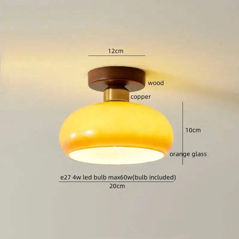 Warm yellow-orange japanese amber glass led ceiling lamp with wooden and copper base ideal for decorbites led ceiling decor