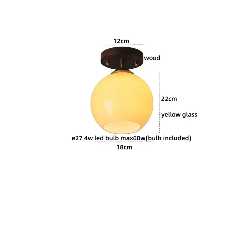 Japanese amber glass led ceiling lamp with warm yellow globe and dark wood base for decorbites led ceiling decor