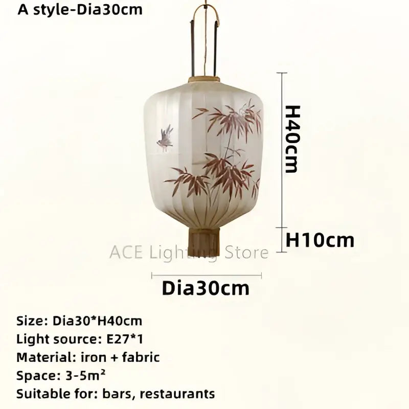 Japanese bamboo leaf pattern paper lantern with translucent white fabric and delicate brown bamboo leaf pattern framed by iron