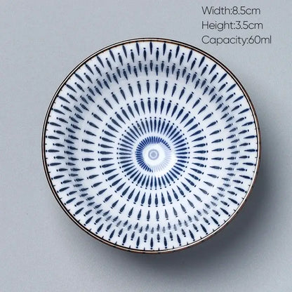 A white porcelain kung fu tea cup bowl with blue radial pattern and gold rim from decorbites ceramic kung collection