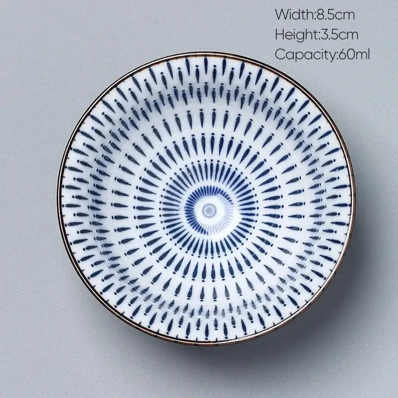 A white porcelain kung fu tea cup bowl with blue radial pattern and gold rim from decorbites ceramic kung collection