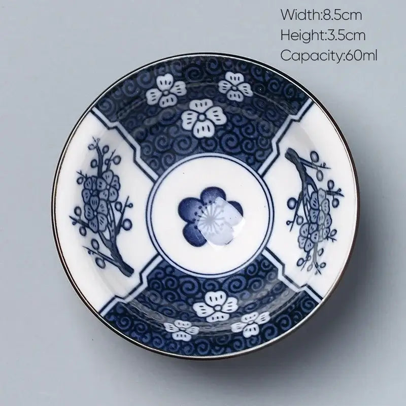 Traditional blue and white porcelain decorbites ceramic kung fu tea cup featuring intricate cherry blossoms and plum branches patterns