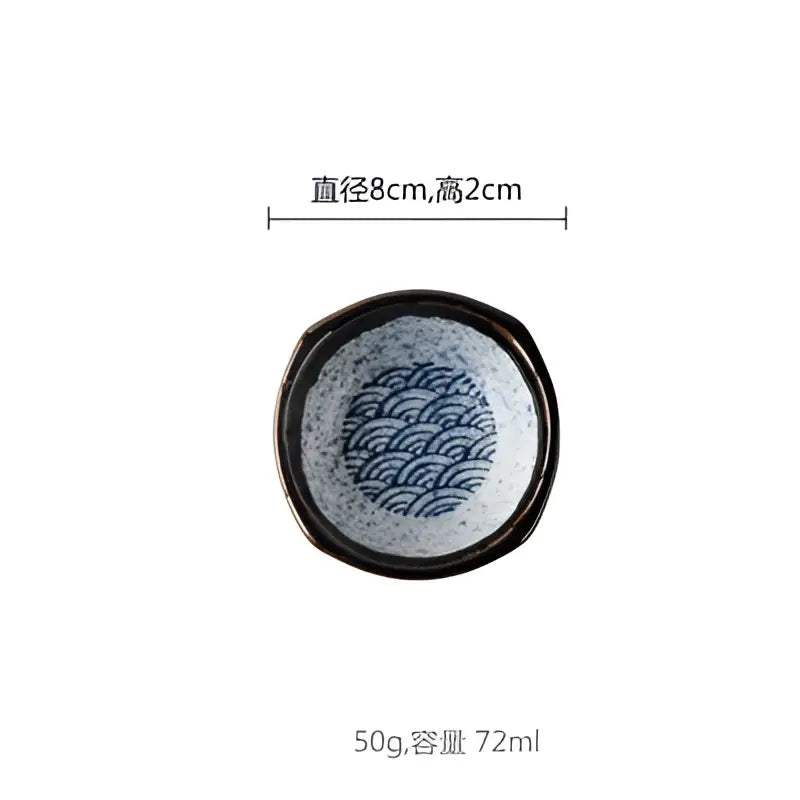 A small round ceramic japanese porcelain chopsticks holder bowl with black rim and blue wave patterns for dining decorbites ceramic japanese