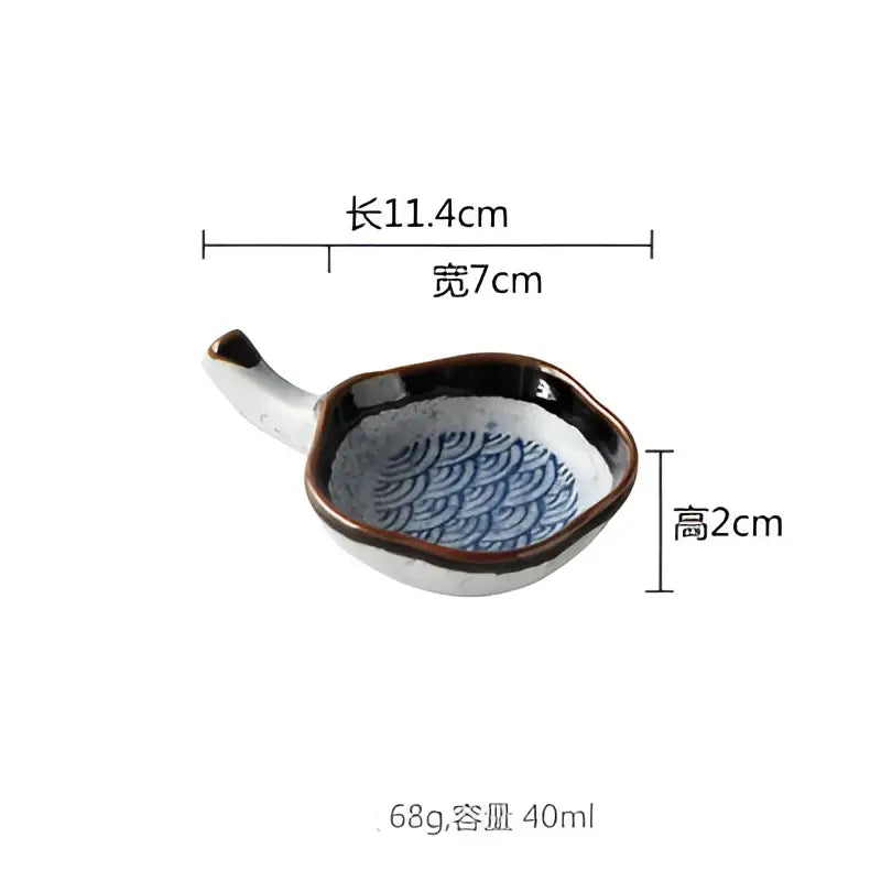A ceramic japanese porcelain sake spoon rest with dark brown rim and light blue wave pattern for dining decorbites ceramic japanese