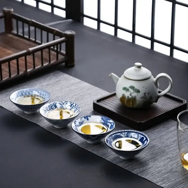 White ceramic kung fu tea teapot with delicate green and gold landscape painting for ceramic kung tea cup set