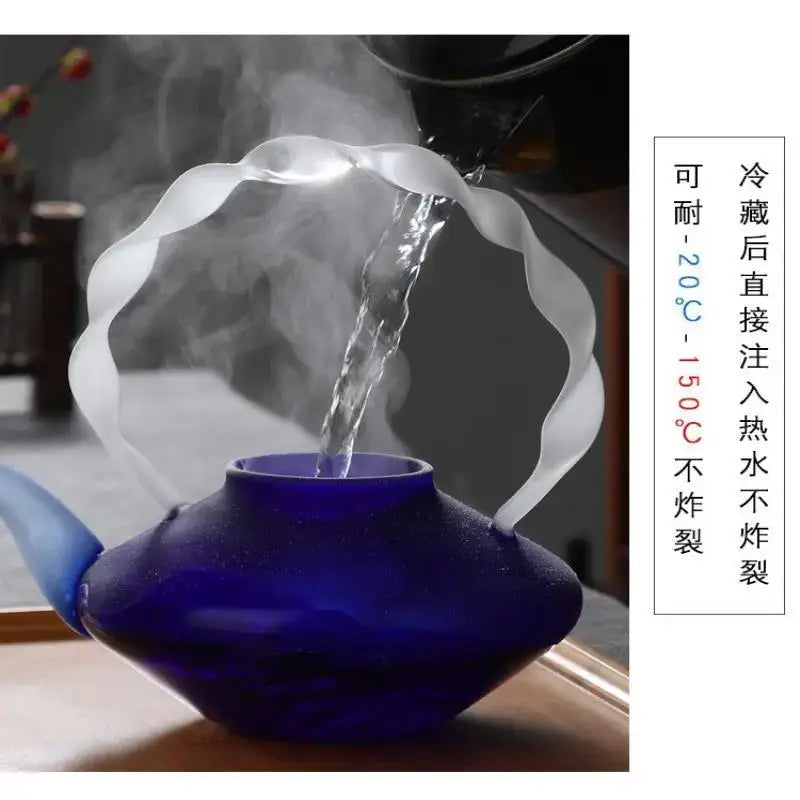 Deep blue glass teapot with scalloped translucent white handle and spout perfect for decorbites blue glass teapot decor