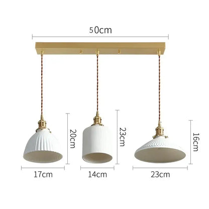 Set of three Japanese cream ribbed ceramic led pendant lights with gold fixtures and braided cords for dining room decorbites ceramic led pendant