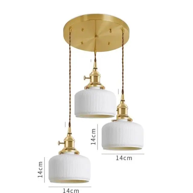 Set of three japanese cream ribbed ceramic led pendant lights with gold fixtures and braided cords for dining room decorbites ceramic led