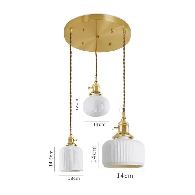 Set of three Japanese cream ceramic led pendant lights with ribbed glass and gold fixtures for dining room decorbites ceramic led