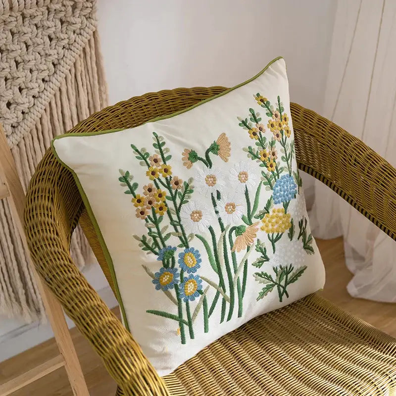 Cream-colored cotton linen embroidery pillowcase with intricate yellow blue and green floral design for bedroom decorbites decor