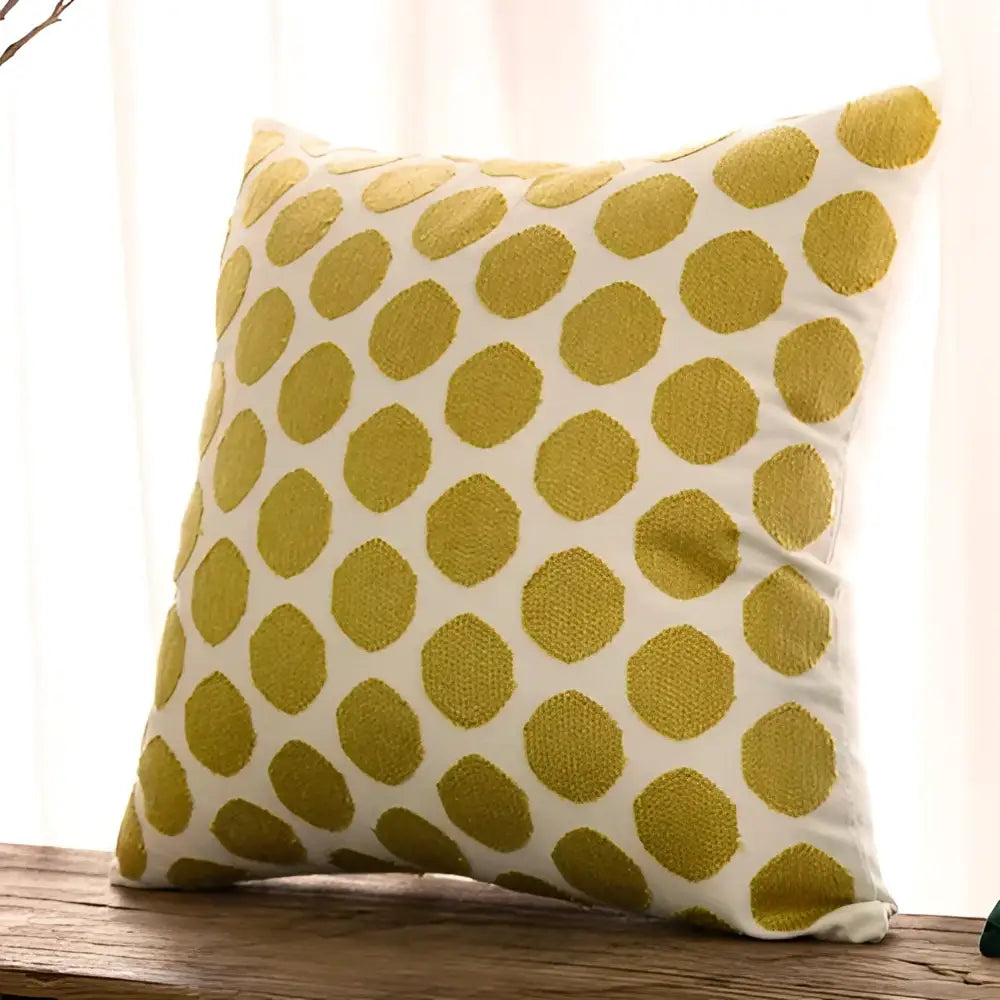 A square cotton linen embroidery pillowcase with white base and mustard-yellow polka dots for bedroom decorbites decor