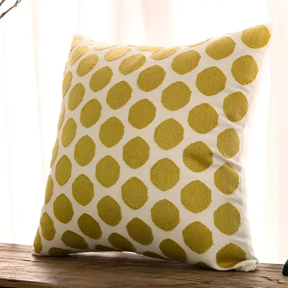 A square cotton linen embroidery pillowcase with white base and mustard-yellow polka dots for bedroom decorbites decor