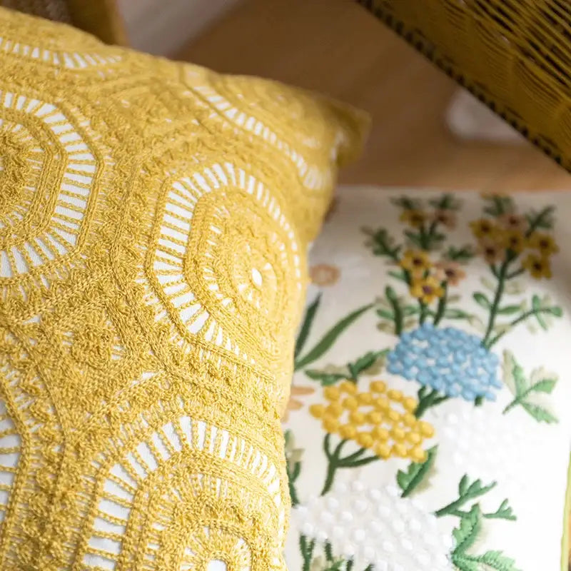 A mustard-yellow cotton linen embroidery pillowcase with intricate lace-like patterns for bedroom decorbites cotton linen
