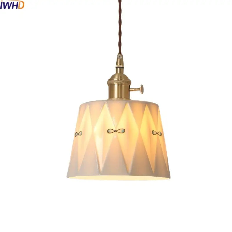Japanese geometric ceramic led pendant light in warm tones with brass accents and twisted cord for modern decorbites ceramic led decor