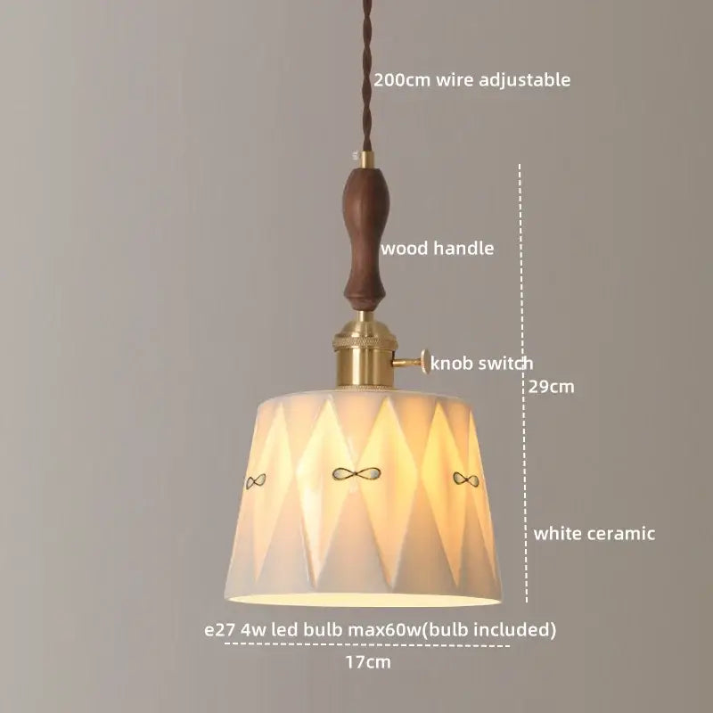 White ceramic geometric pendant light with infinity symbol accents and brass details by decorbites ceramic led pendant