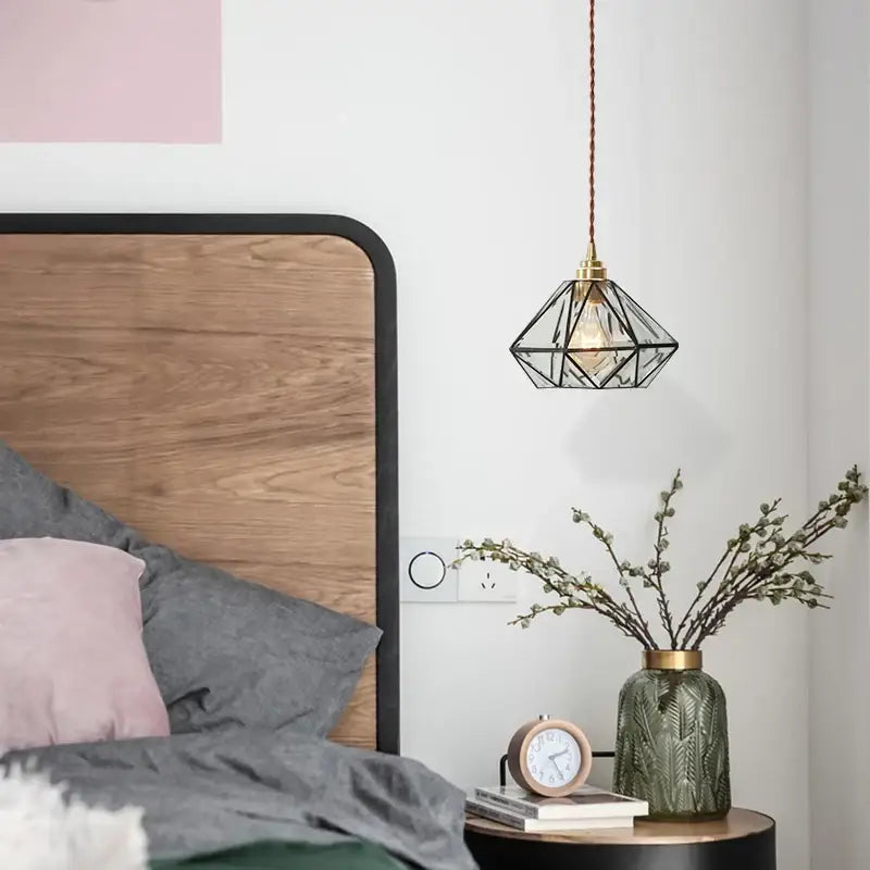 Geometric glass led pendant lamp with brass-finished metal frame and clear glass panels for dining room lighting