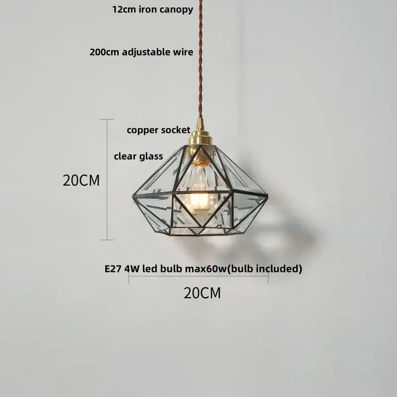 Japanese geometric glass led pendant lamp with black metal frame, clear panels, brass socket, and braided cord suspension