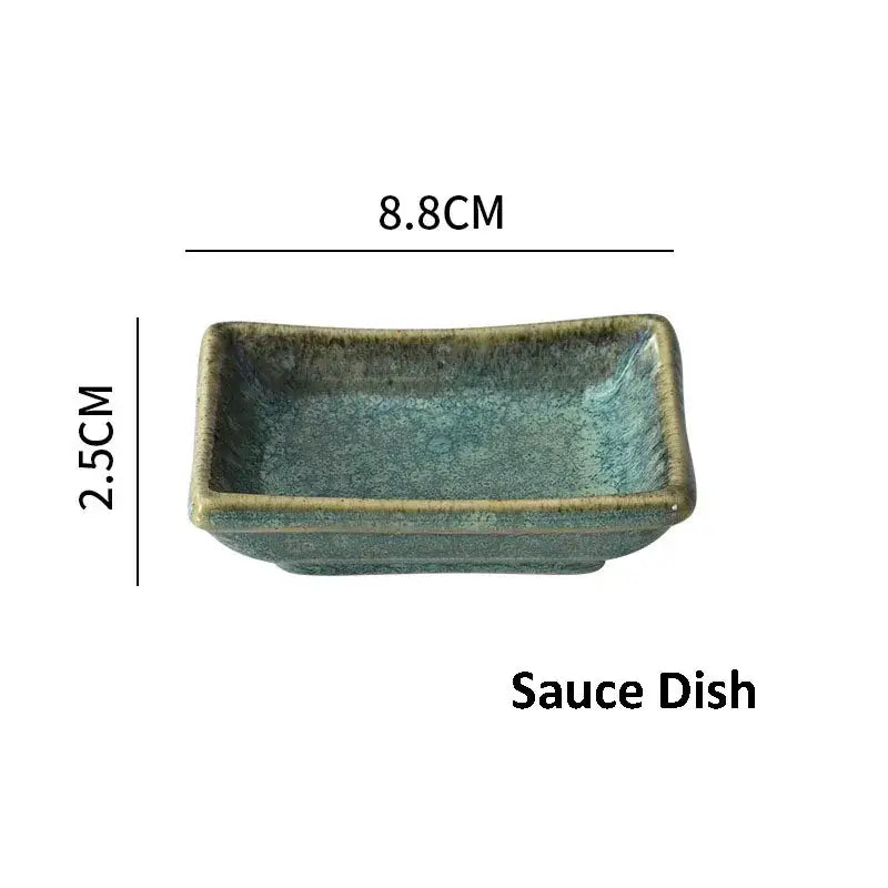 A rectangular ceramic sauce dish with textured teal glaze and earth toned rim from decorbites ceramic dinnerware set