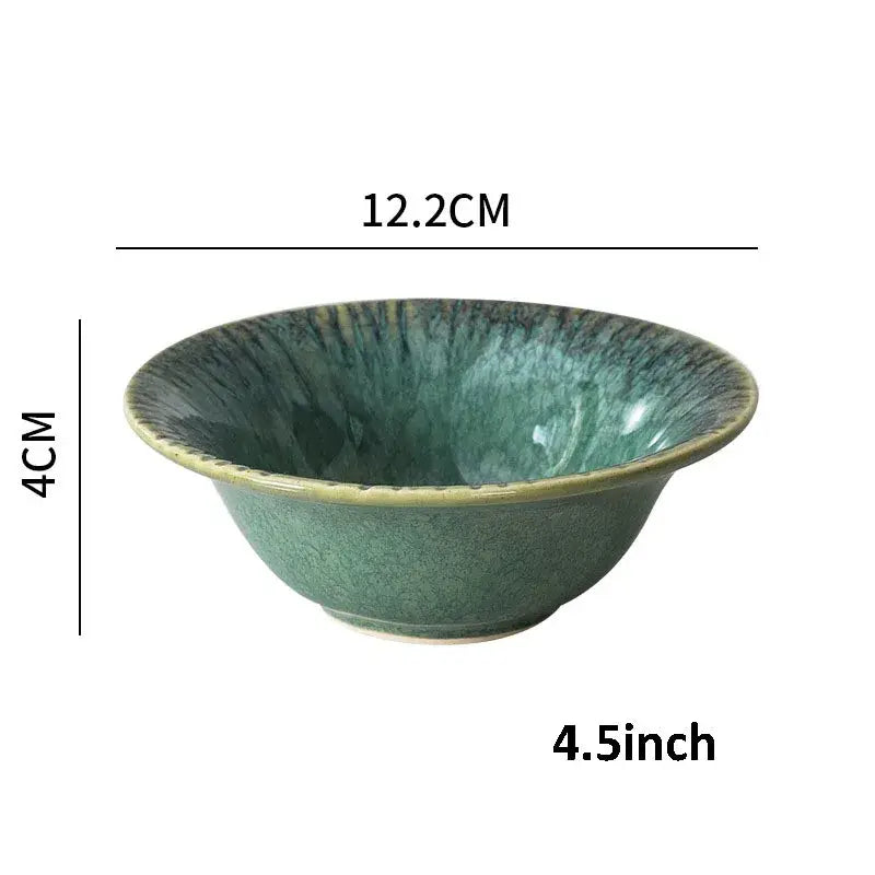 A handcrafted ceramic dinnerware bowl in teal with radial streaks and a raised rim from decorbites ceramic dinnerware set