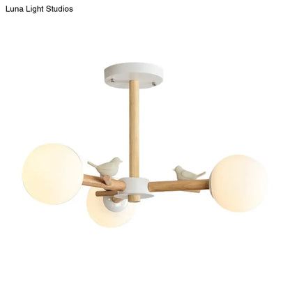 Japanese-Inspired Bedroom Chandelier with Orb Shade, Birds, Wood, and Glass in White