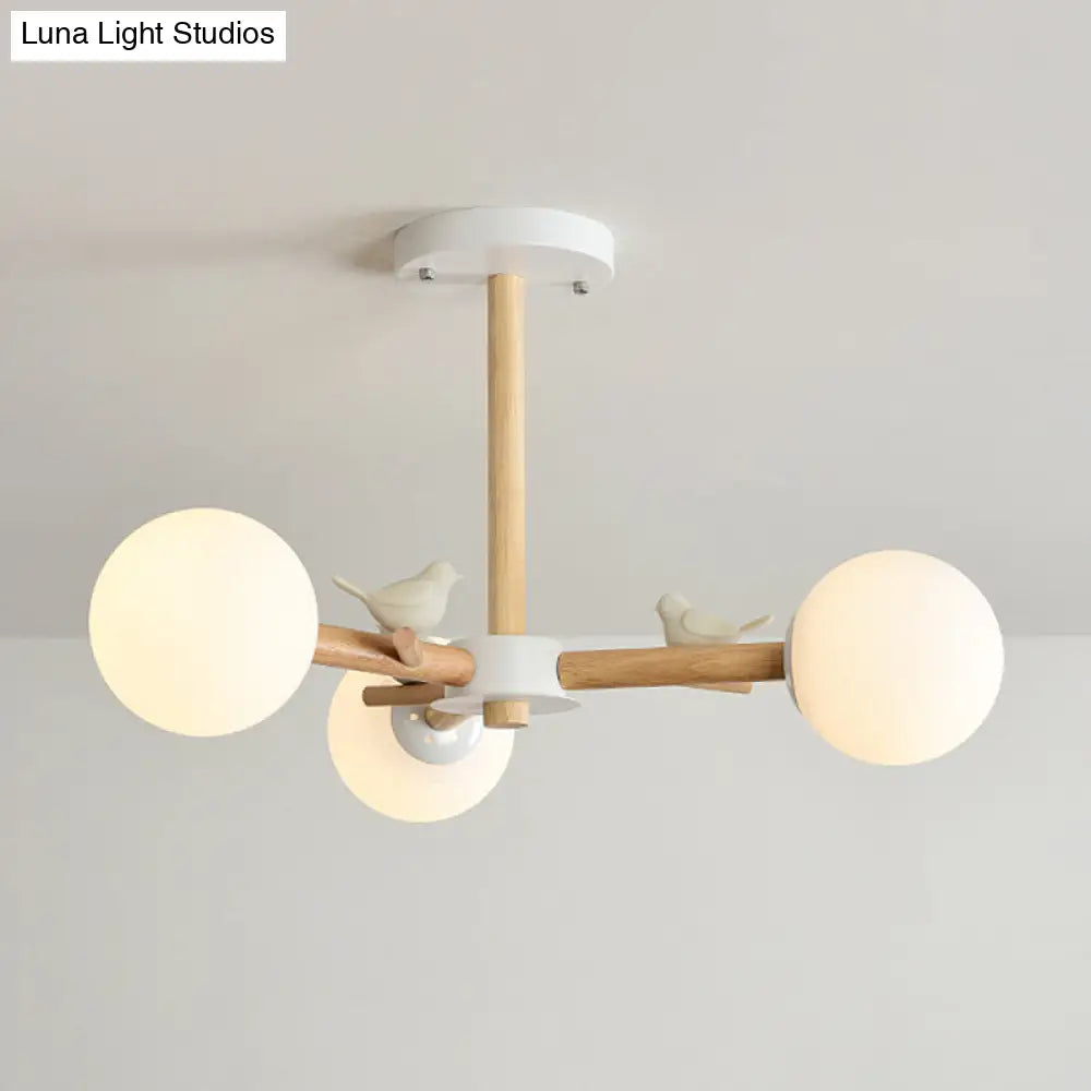 Japanese-Inspired Bedroom Chandelier with Orb Shade, Birds, Wood, and Glass in White