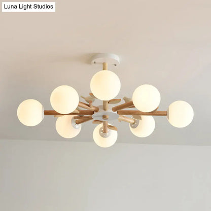 Japanese-Inspired Bedroom Chandelier with Orb Shade, Birds, Wood, and Glass in White